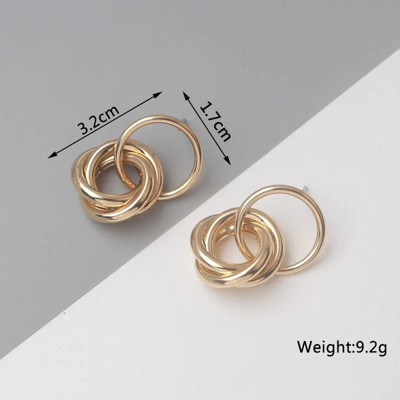 Stylish Twist Dangle Earrings – Bold & Elegant Gold Hoops for Women