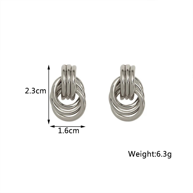Stylish Twist Dangle Earrings – Bold & Elegant Gold Hoops for Women