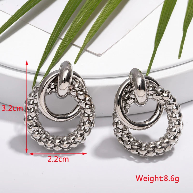 Stylish Twist Dangle Earrings – Bold & Elegant Gold Hoops for Women