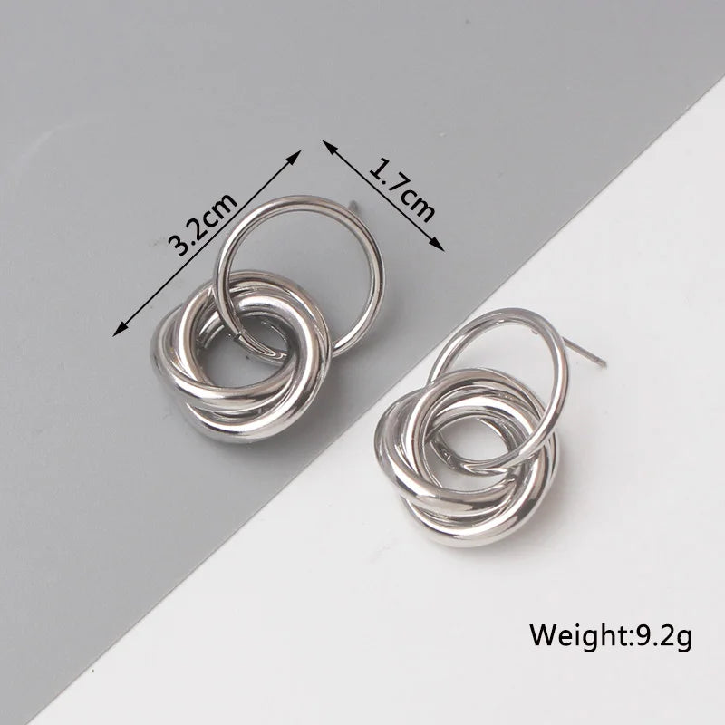 Stylish Twist Dangle Earrings – Bold & Elegant Gold Hoops for Women