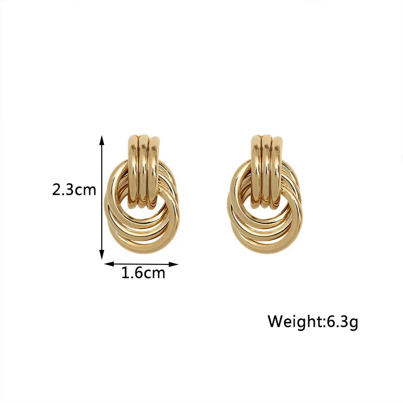 Stylish Twist Dangle Earrings – Bold & Elegant Gold Hoops for Women