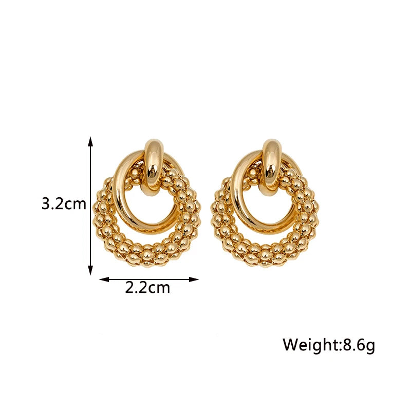 Stylish Twist Dangle Earrings – Bold & Elegant Gold Hoops for Women