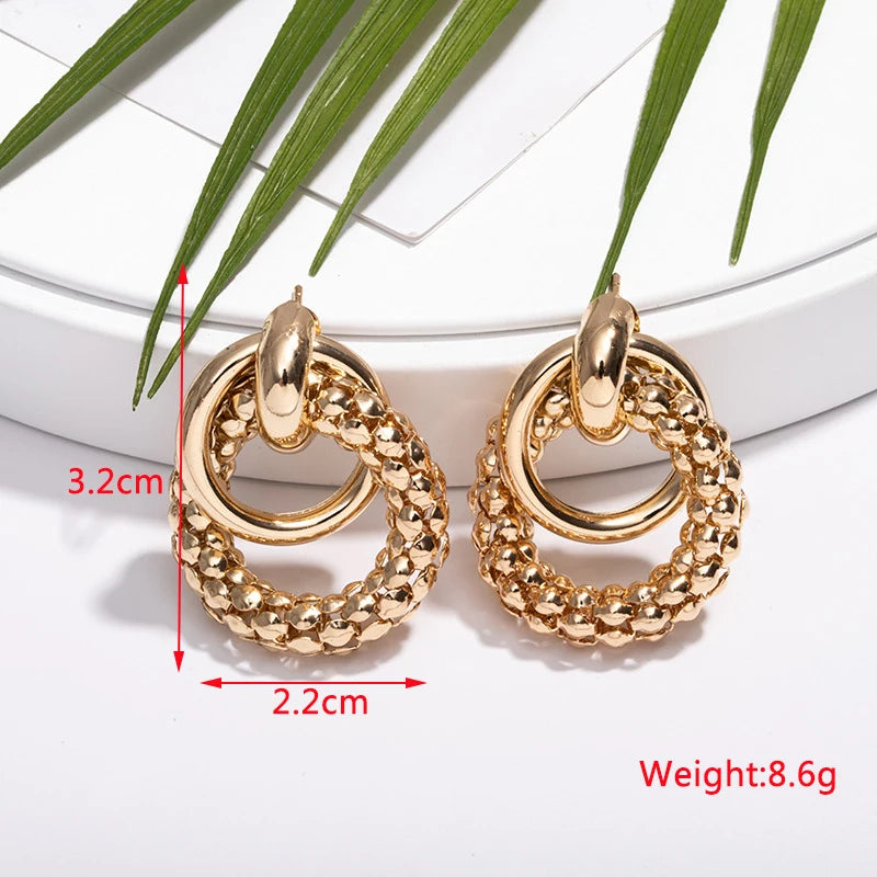 Stylish Twist Dangle Earrings – Bold & Elegant Gold Hoops for Women