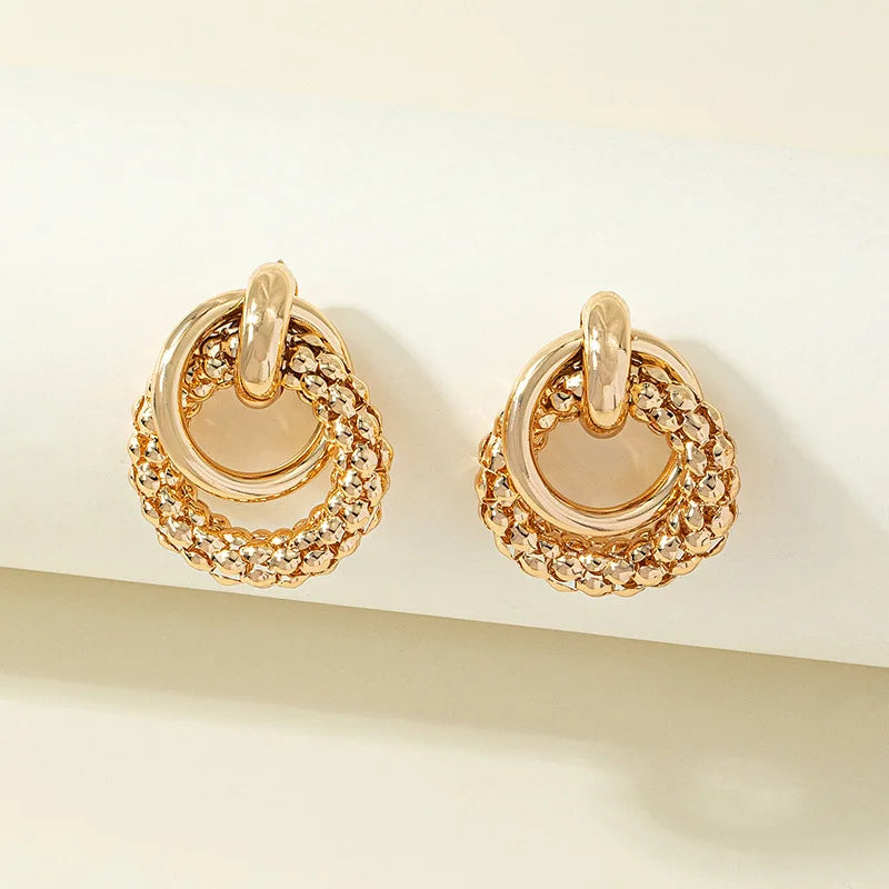 Stylish Twist Dangle Earrings – Bold & Elegant Gold Hoops for Women